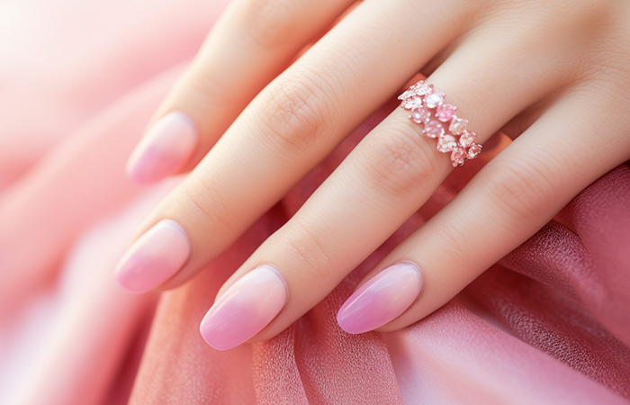 Pink ombré dip nails with a soft pink base