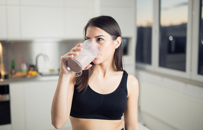 Woman drinking soy protein shake